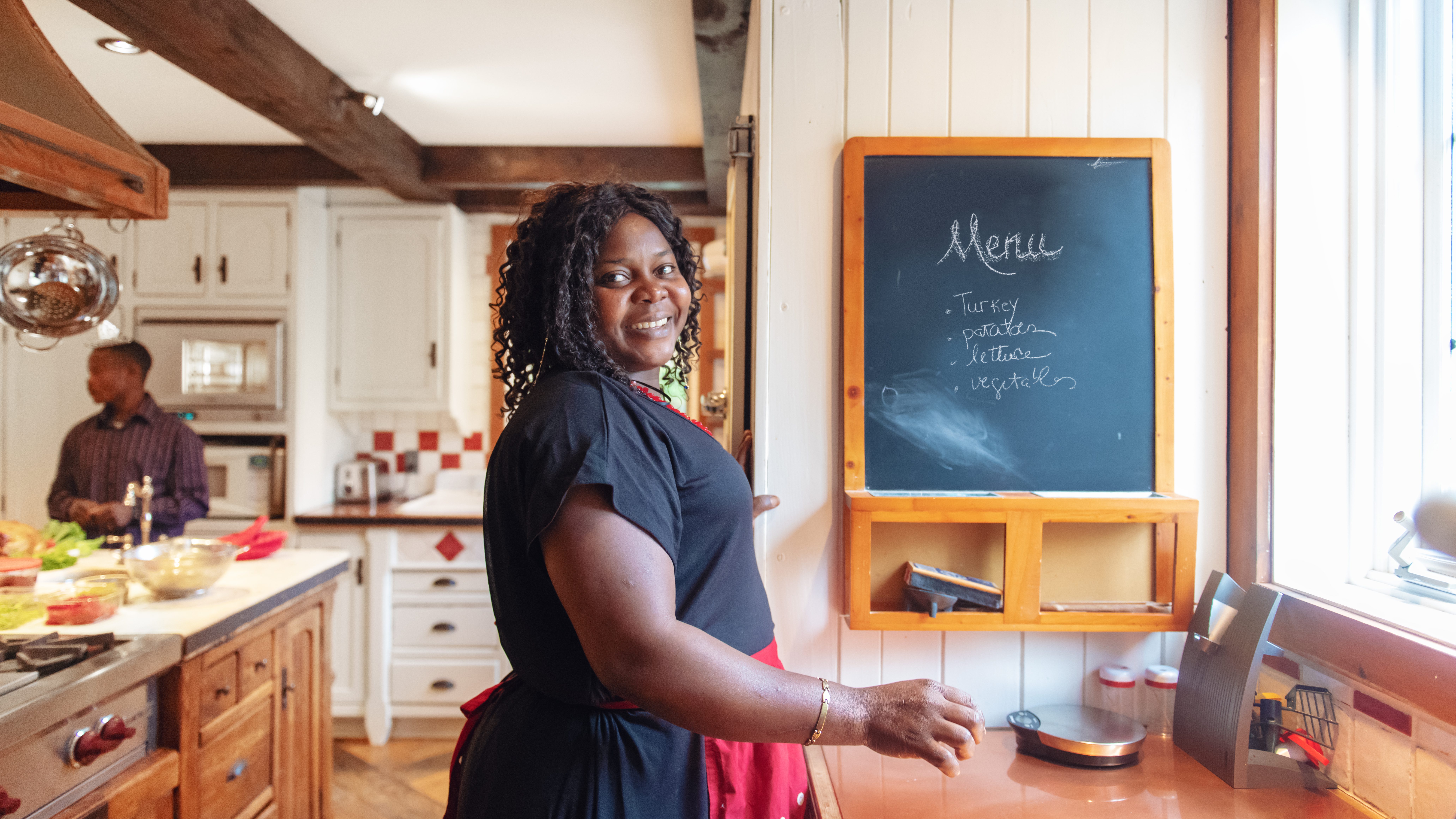 African-American preparing thanksgiving dinner