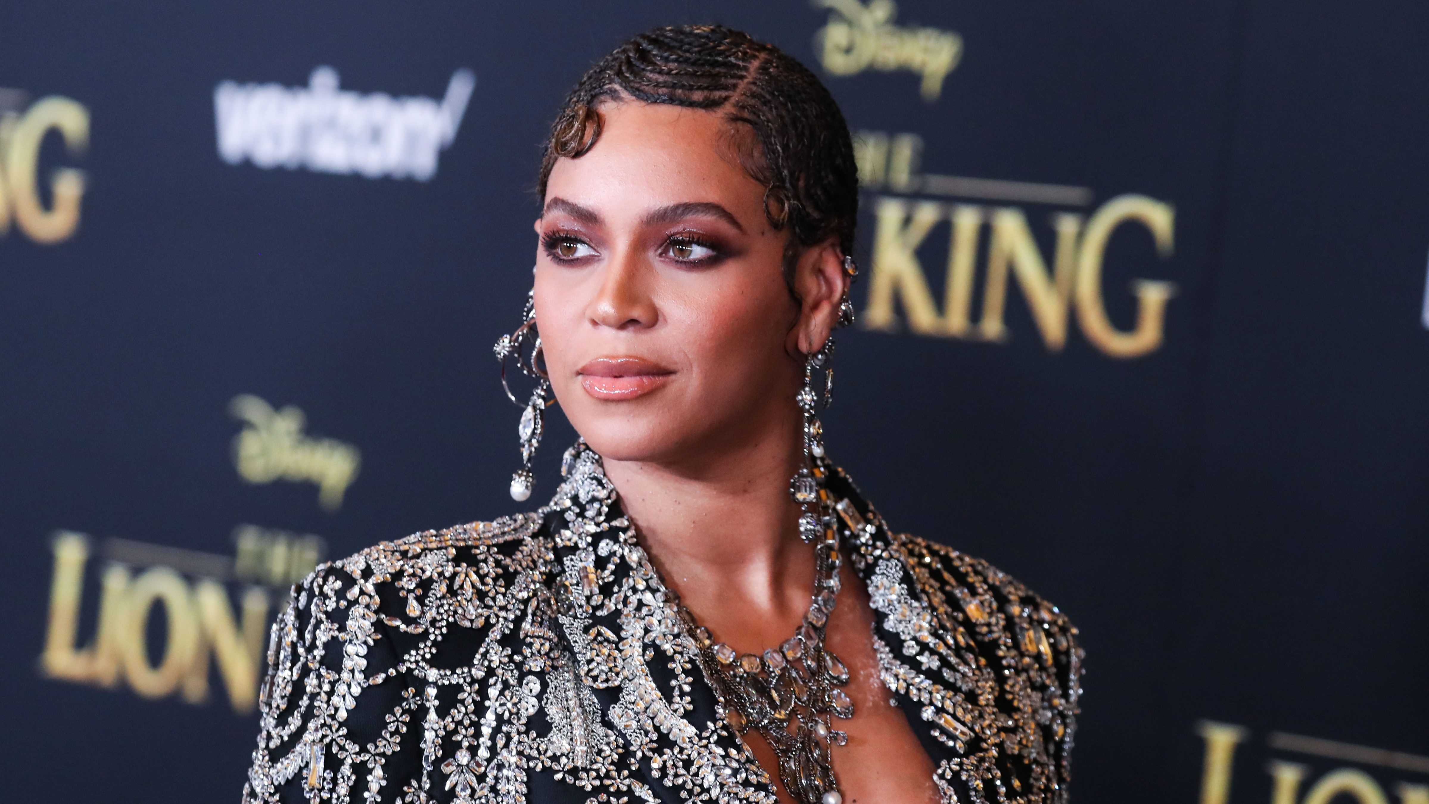 Singer Beyonce Knowles Carter wearing an outfit by Alexander McQueen and Lorraine Schwartz jewelry arrives at the World Premiere Of Disney's 'The Lion King' held at the Dolby Theatre on July 9, 2019 in Hollywood, Los Angeles, California, United States. (P