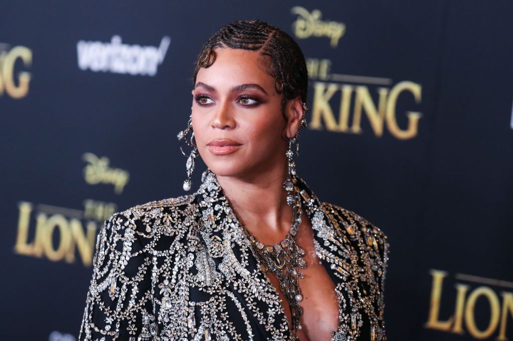 Singer Beyonce Knowles Carter wearing an outfit by Alexander McQueen and Lorraine Schwartz jewelry arrives at the World Premiere Of Disney's 'The Lion King' held at the Dolby Theatre on July 9, 2019 in Hollywood, Los Angeles, California, United States. (P
