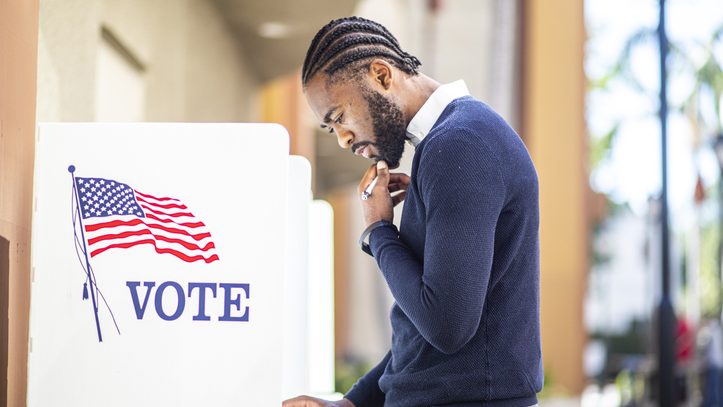 Millenial Black Man Voting in Election